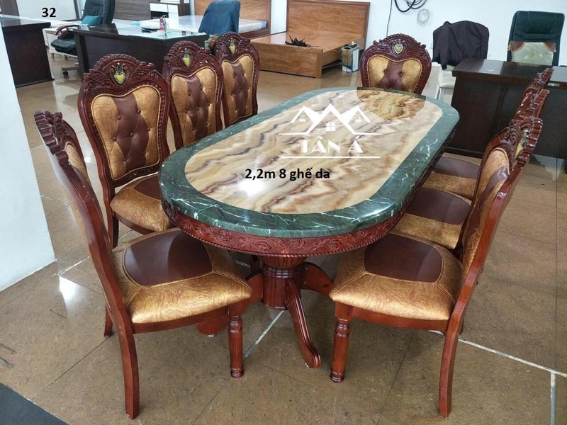 Bộ bàn ăn mặt đá oval 8 ghế gỗ bọc nệm da