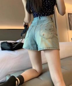 Quần short jean nữ lưng cao không co giãn thêu hoa nhí